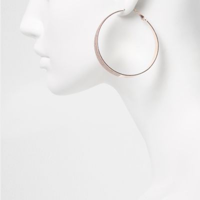 Rose gold tone glitter hoop earrings